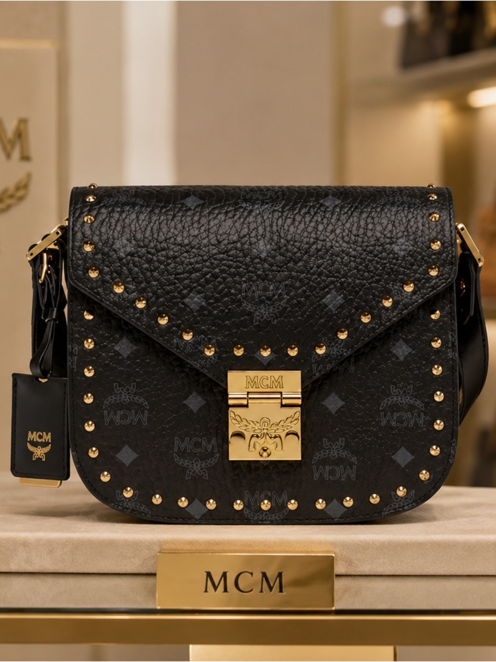 MCM Patricia Studded Outline Shoulder Bag In Visetos In Black